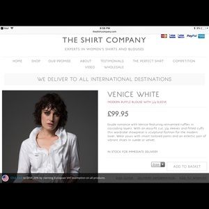 White ruffled blouse